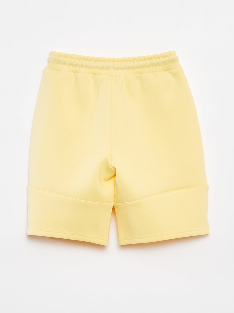 Calções em moletão leve tipo ténis AMARELO - Kiabi