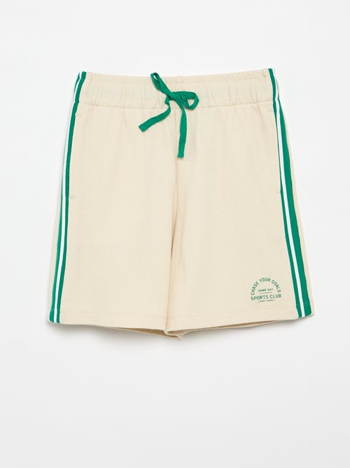 Calções largos com riscas contrastantes nas laterais - Kiabi