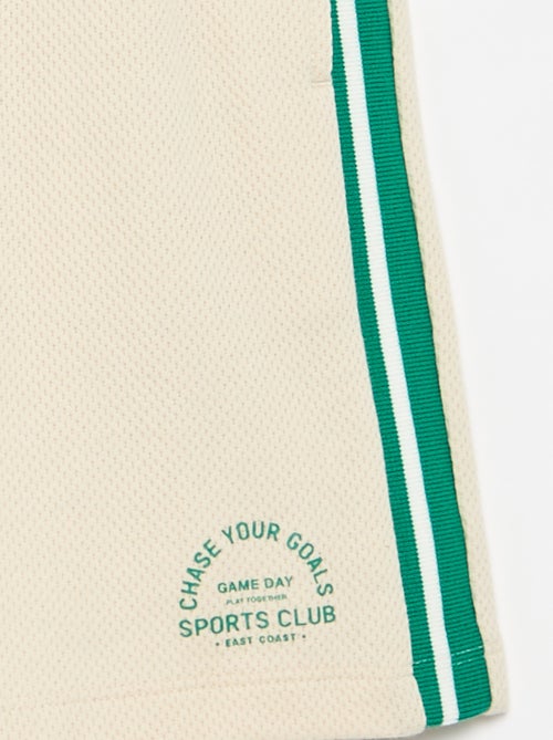 Calções largos com riscas contrastantes nas laterais - Kiabi