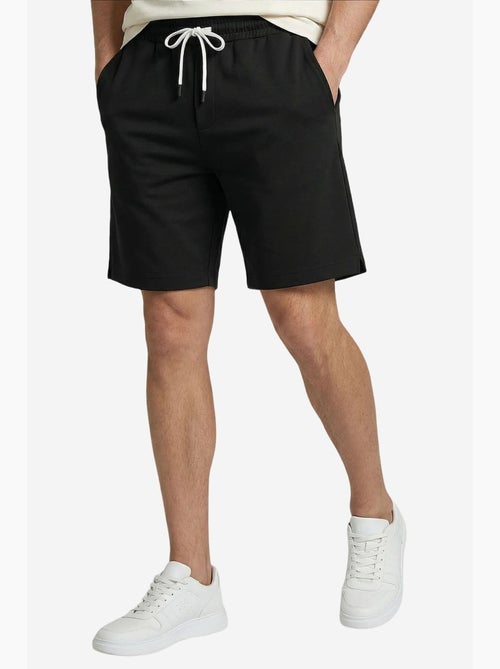 Calções masculinos de poliéster-elastano tommy - Kiabi Calções masculinos de poliéster-elastano tommy - Kiabi
