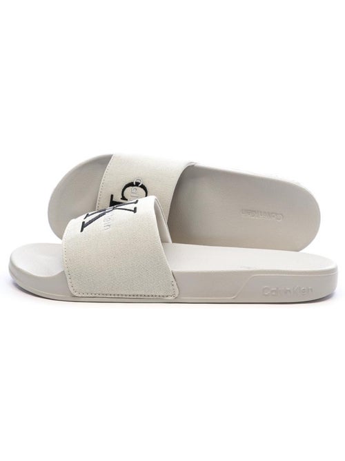 Calvin Klein Jeans Claquettes Slide Bege para Homem - Kiabi Calvin Klein Jeans Claquettes Slide Bege para Homem - Kiabi
