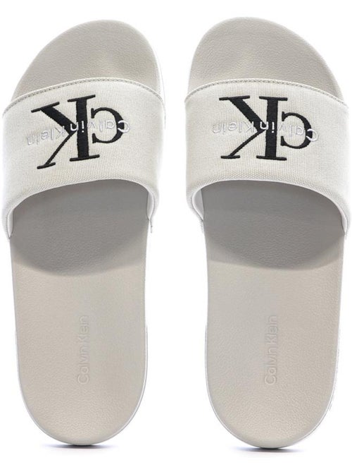 Calvin Klein Jeans Claquettes Slide Bege para Homem - Kiabi Calvin Klein Jeans Claquettes Slide Bege para Homem - Kiabi