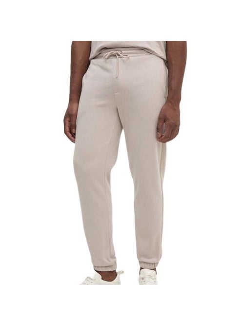 Calvin Klein Jeans Jogging Bege com Fita Logótipo para Mulher - Kiabi Calvin Klein Jeans Jogging Bege com Fita Logótipo para Mulher - Kiabi