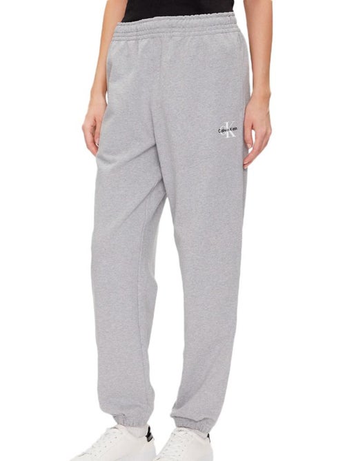 Calvin Klein Jeans Monologo Jogging Cinzento para Mulher - Kiabi Calvin Klein Jeans Monologo Jogging Cinzento para Mulher - Kiabi