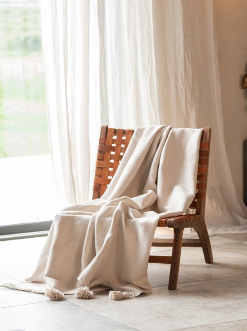 Cama de lã com borlas - Kiabi Cama de lã com borlas - Kiabi