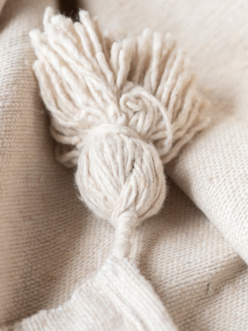 Cama de lã com borlas Creme - Kiabi