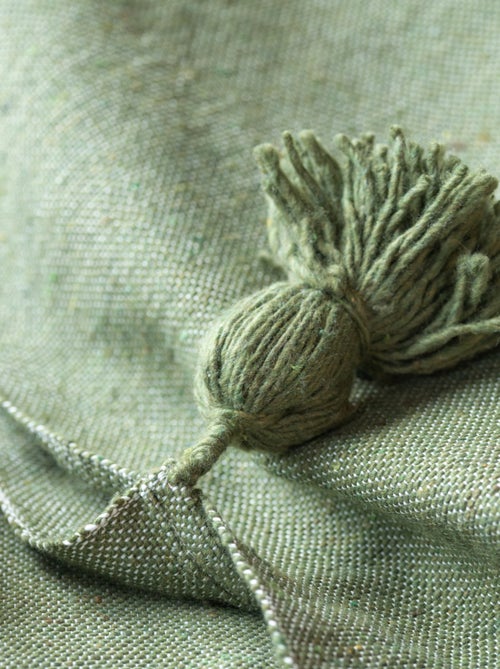 Cama de lã com borlas - Kiabi