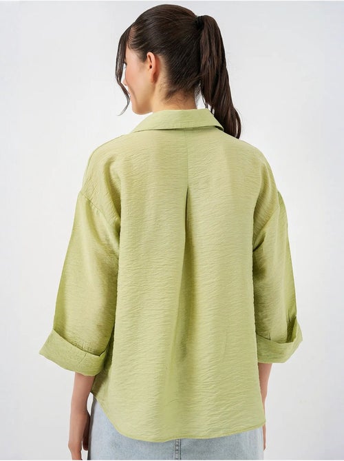 Camisa abotoada em tecido texturizado bdart - Kiabi Camisa abotoada em tecido texturizado bdart - Kiabi