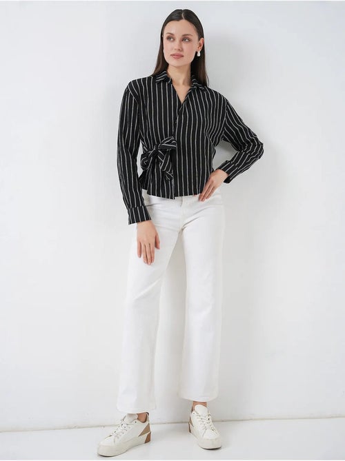 Camisa às riscas de manga comprida com detalhe de laço bdart - Kiabi Camisa às riscas de manga comprida com detalhe de laço bdart - Kiabi
