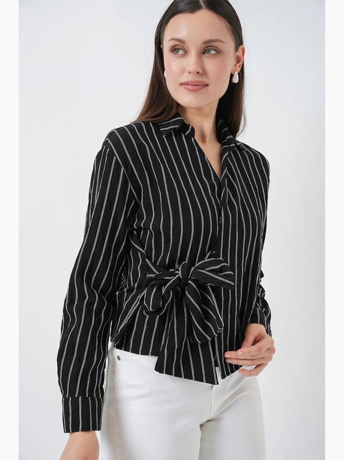 Camisa às riscas de manga comprida com detalhe de laço bdart - Kiabi Camisa às riscas de manga comprida com detalhe de laço bdart - Kiabi