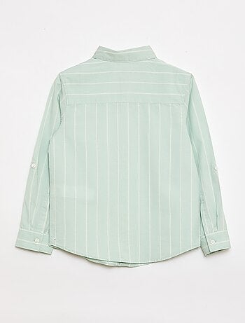 Camisa às riscas em algodão com bolso no peito