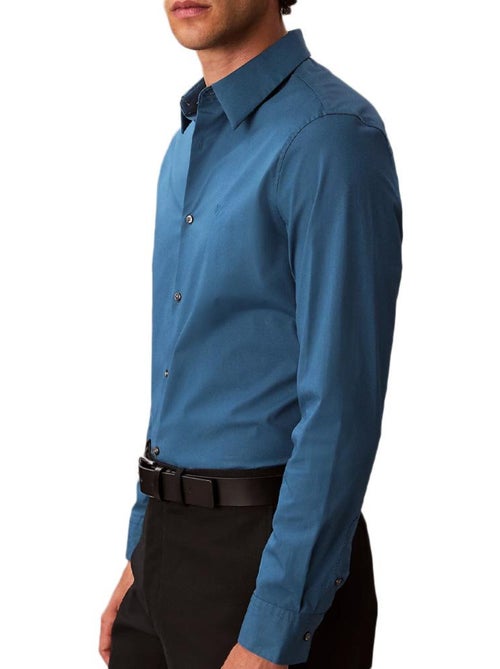 Camisa Azul Sólida Calvin Klein Jeans para Homem - Kiabi Camisa Azul Sólida Calvin Klein Jeans para Homem - Kiabi