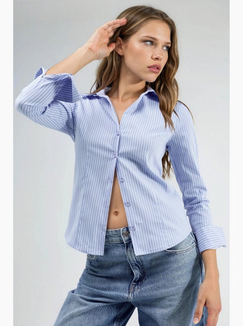 Camisa básica às riscas ajustada hiccup - Kiabi Camisa básica às riscas ajustada hiccup - Kiabi