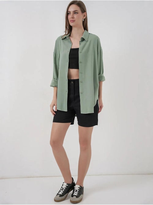 Camisa básica com botões bdart - Kiabi Camisa básica com botões bdart - Kiabi
