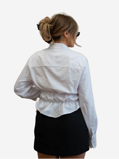 Camisa branca valletta com botões hiccup - Kiabi Camisa branca valletta com botões hiccup - Kiabi