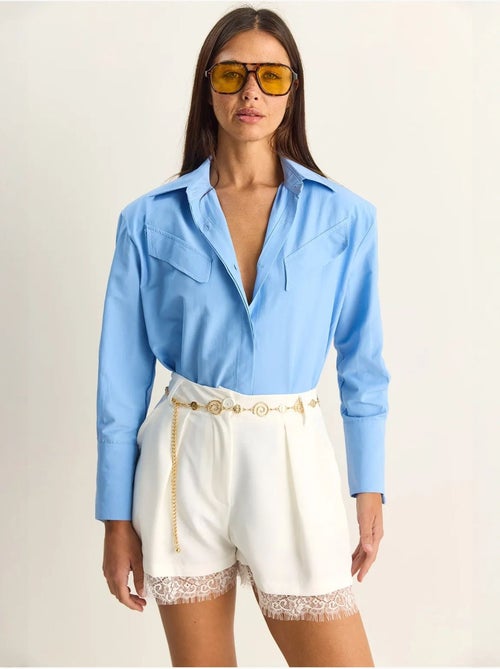 Camisa casual de popelina de manga comprida com botões e bolso lucci - Kiabi Camisa casual de popelina de manga comprida com botões e bolso lucci - Kiabi