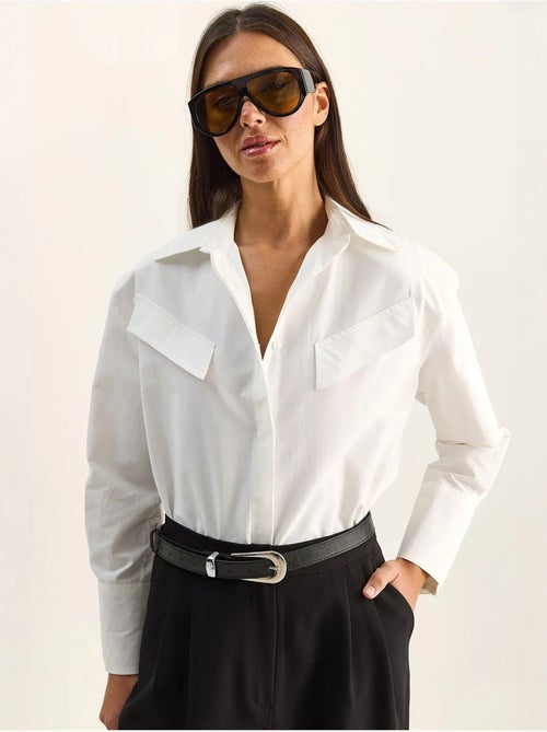 Camisa casual de popelina de manga comprida com botões e bolso lucci - Kiabi Camisa casual de popelina de manga comprida com botões e bolso lucci - Kiabi