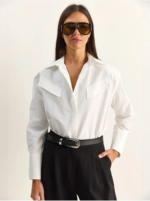 Camisa casual de popelina de manga comprida com botões e bolso lucci - Kiabi Camisa casual de popelina de manga comprida com botões e bolso lucci - Kiabi