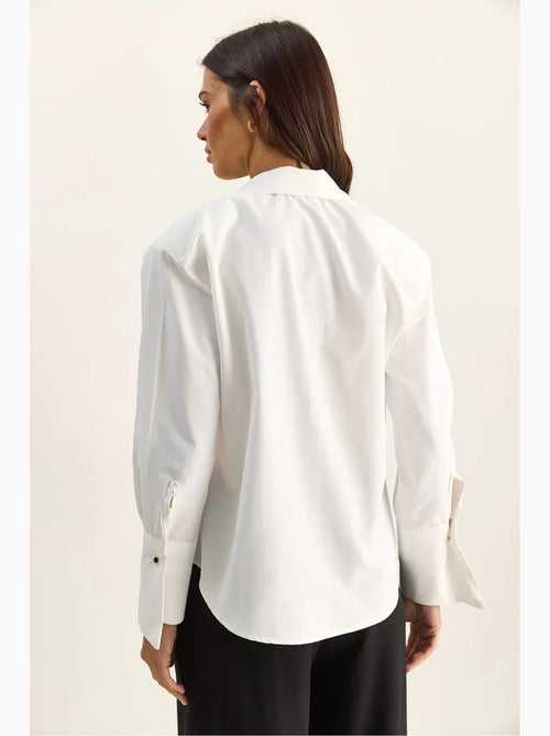 Camisa casual de popelina de manga comprida com botões e bolso lucci - Kiabi Camisa casual de popelina de manga comprida com botões e bolso lucci - Kiabi