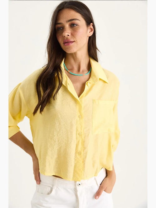 Camisa com detalhe de bolso único e manga curta lucci - Kiabi Camisa com detalhe de bolso único e manga curta lucci - Kiabi