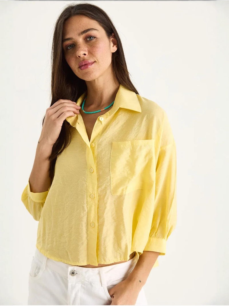 Camisa com detalhe de bolso único e manga curta lucci Amarelo-limão - Kiabi