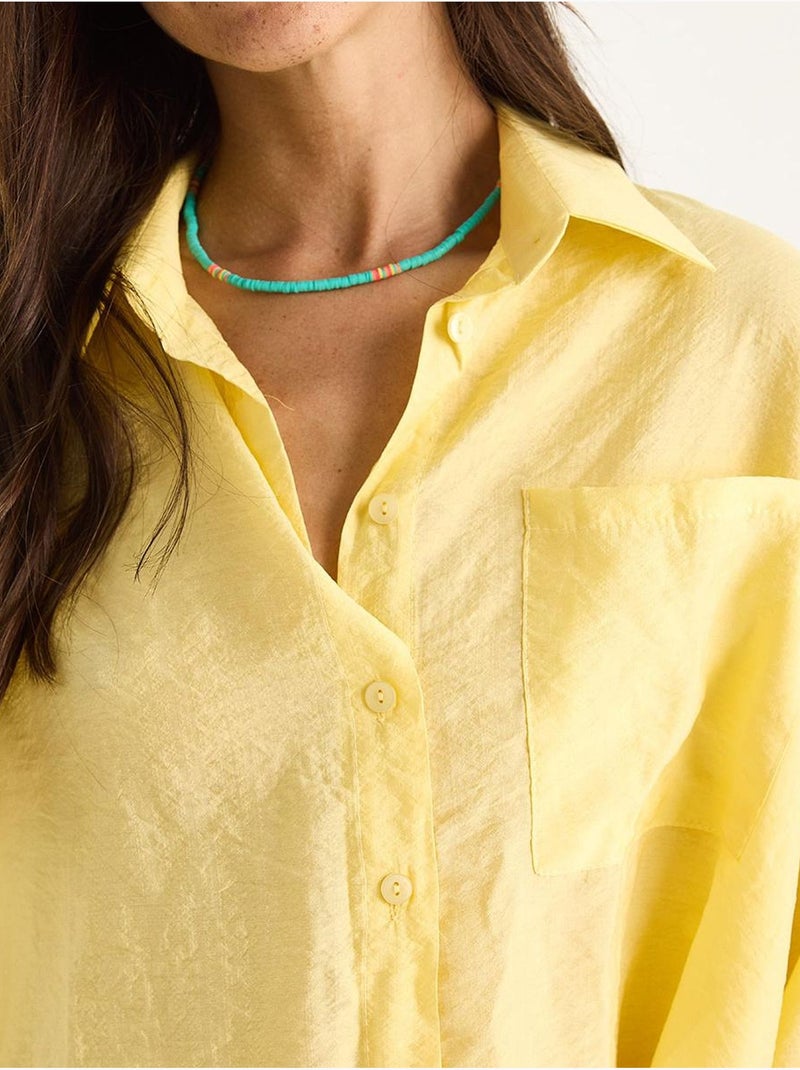 Camisa com detalhe de bolso único e manga curta lucci Amarelo-limão - Kiabi