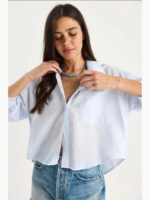 Camisa com detalhe de bolso único e manga curta lucci - Kiabi Camisa com detalhe de bolso único e manga curta lucci - Kiabi
