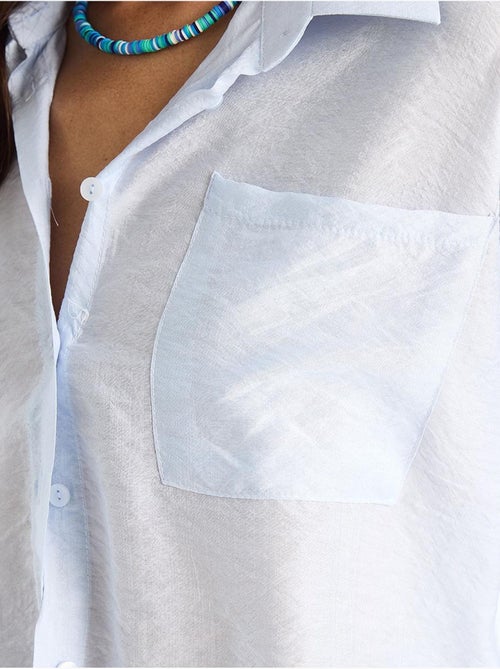 Camisa com detalhe de bolso único e manga curta lucci - Kiabi Camisa com detalhe de bolso único e manga curta lucci - Kiabi