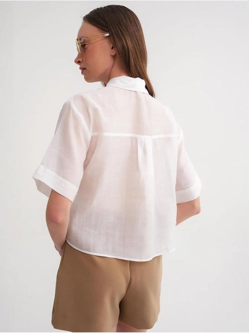 Camisa crop de manga curta com acessórios em pedra mixray - Kiabi Camisa crop de manga curta com acessórios em pedra mixray - Kiabi