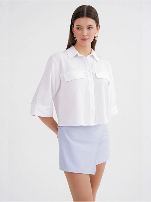 Camisa cropped de popelina de manga curta mixray - Kiabi Camisa cropped de popelina de manga curta mixray - Kiabi