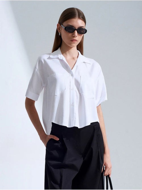 Camisa cropped feminina com bolso dilvin - Kiabi Camisa cropped feminina com bolso dilvin - Kiabi