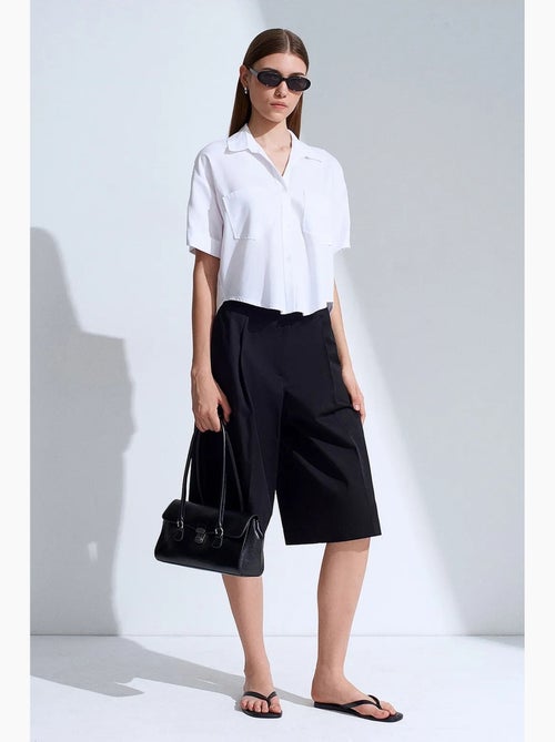 Camisa cropped feminina com bolso dilvin - Kiabi Camisa cropped feminina com bolso dilvin - Kiabi