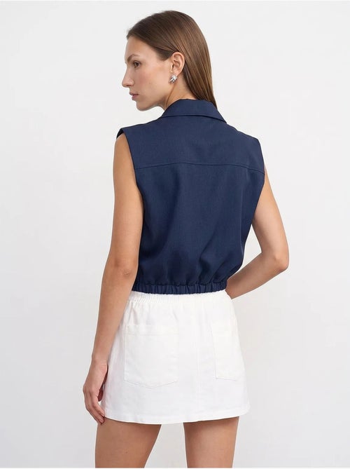 Camisa curta feminina sem mangas com fecho de correr dilvin - Kiabi