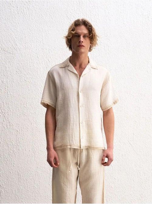 Camisa de algodão texturado de manga curta para homem giesto - Kiabi Camisa de algodão texturado de manga curta para homem giesto - Kiabi