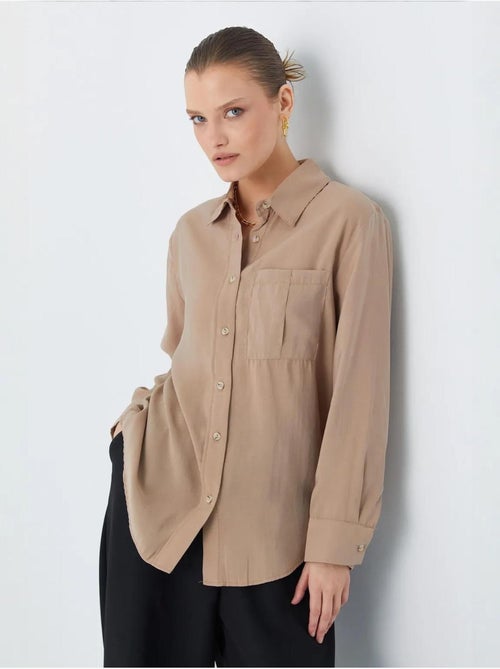 Camisa de corte descontraído com bolso mixray - Kiabi Camisa de corte descontraído com bolso mixray - Kiabi