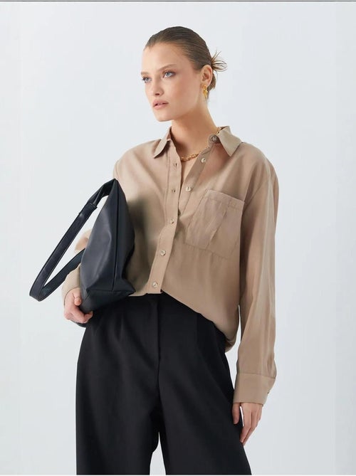 Camisa de corte descontraído com bolso mixray - Kiabi Camisa de corte descontraído com bolso mixray - Kiabi