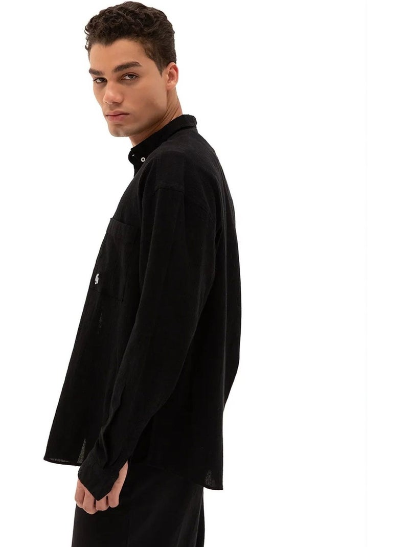 Camisa de homem em algodão de manga comprida com gola abotoada giesto Preto - Kiabi