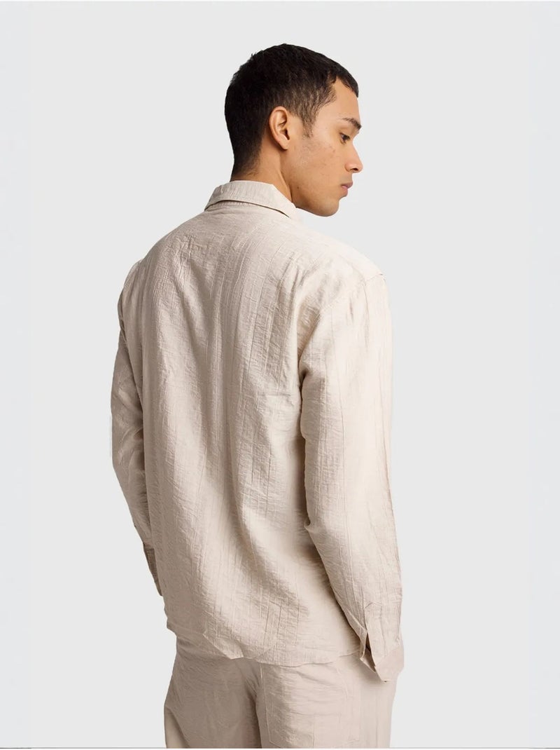 Camisa de manga comprida com botões e bolso giesto Bege-argila - Kiabi