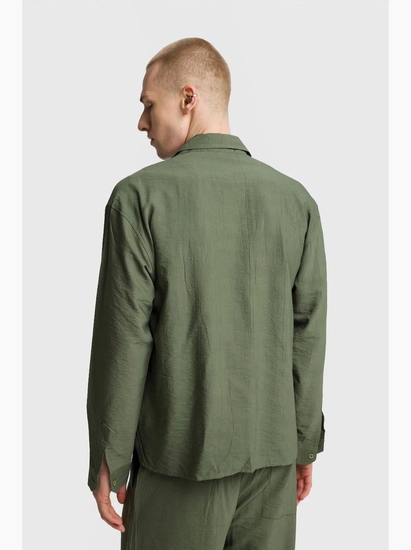 Camisa de manga comprida com botões e bolso giesto Cáqui - Kiabi