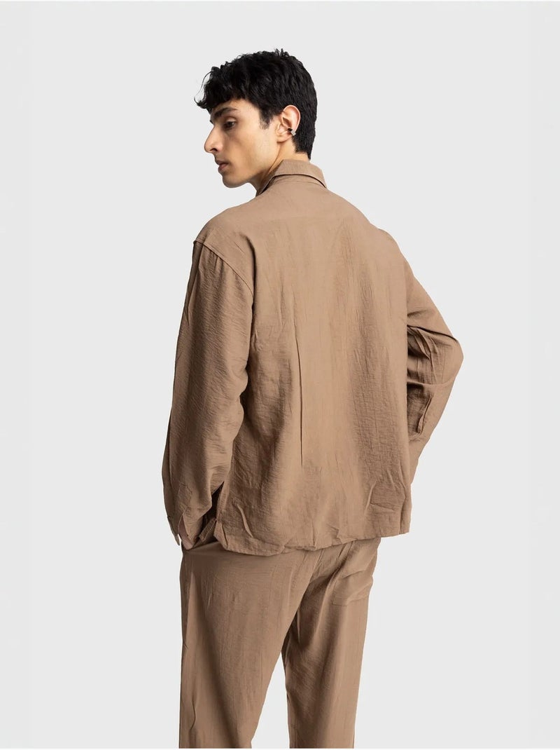 Camisa de manga comprida com botões e bolso giesto Greige - Kiabi