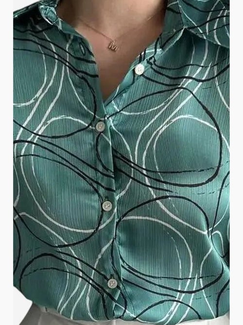 Camisa de manga comprida com estampado geométrico e fecho de botões my fashion - Kiabi Camisa de manga comprida com estampado geométrico e fecho de botões my fashion - Kiabi