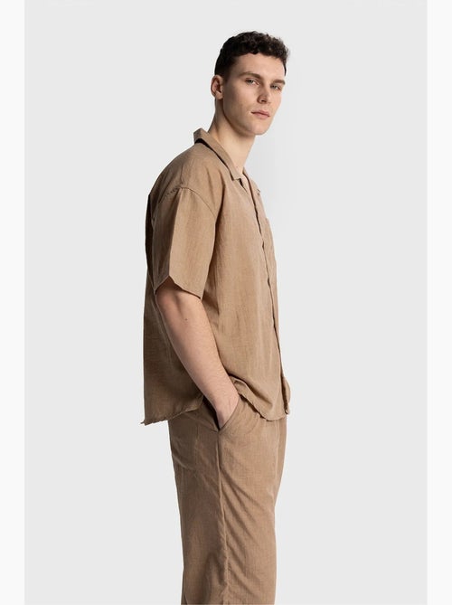 Camisa de manga curta de corte descontraído para homem giesto - Kiabi Camisa de manga curta de corte descontraído para homem giesto - Kiabi
