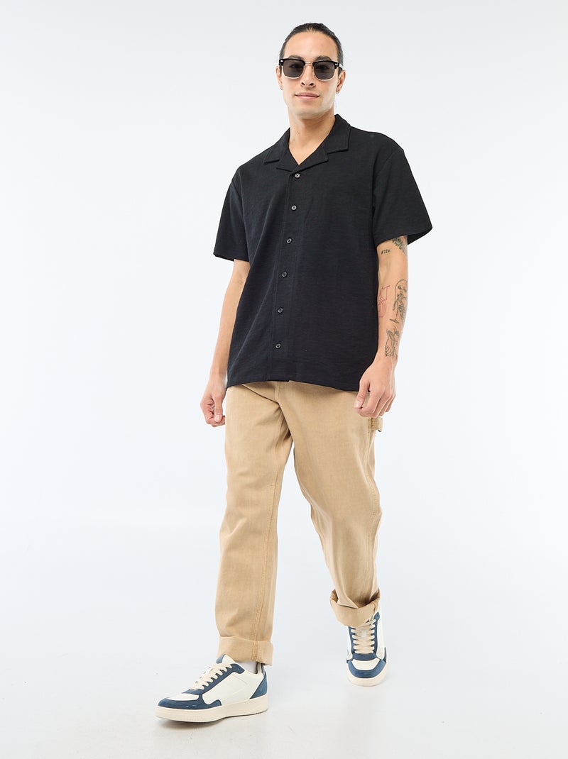 Camisa de manga curta em malha Preto - Kiabi