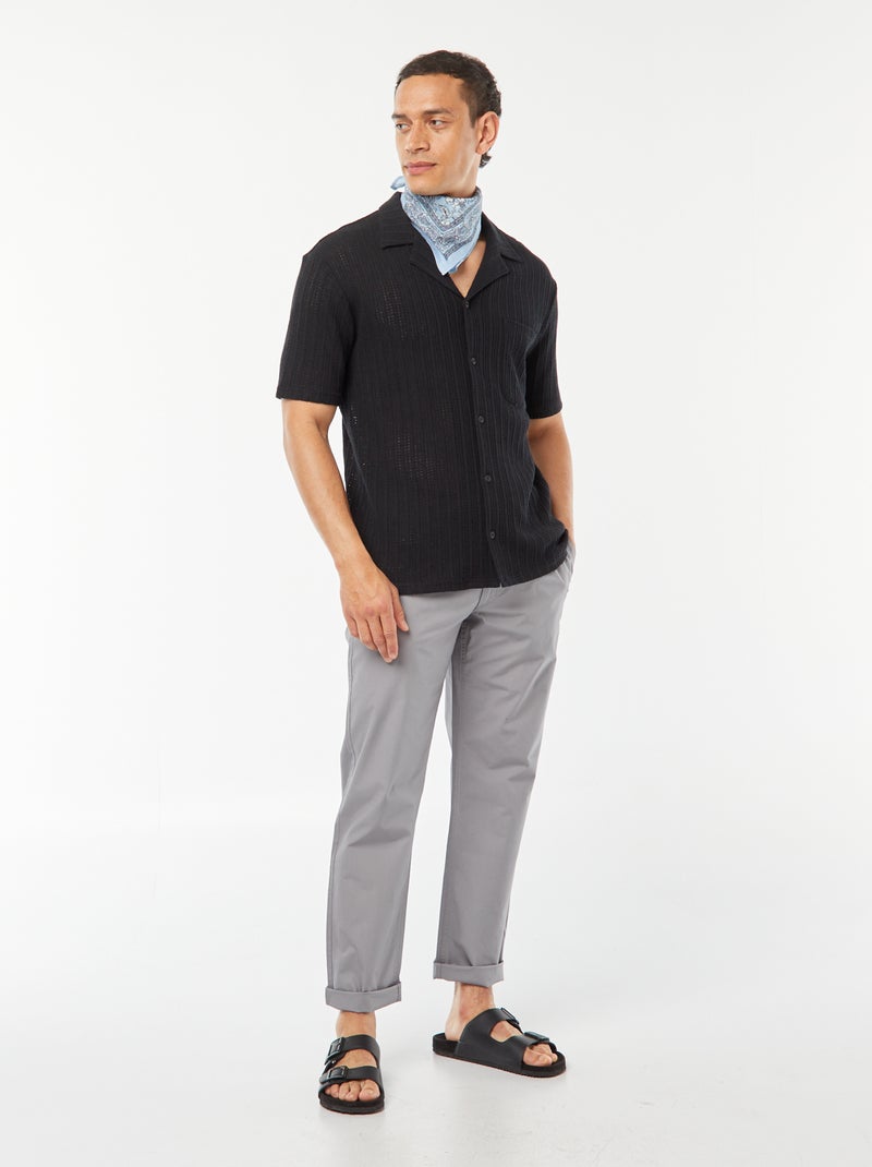 Camisa de manga curta em tecido ajurado Preto - Kiabi