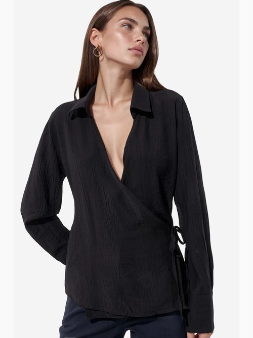 Camisa de poliéster feminina busem - Kiabi Camisa de poliéster feminina busem - Kiabi