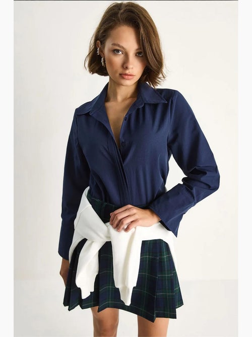 Camisa de popelina regular fit de manga comprida com botões lucci - Kiabi Camisa de popelina regular fit de manga comprida com botões lucci - Kiabi