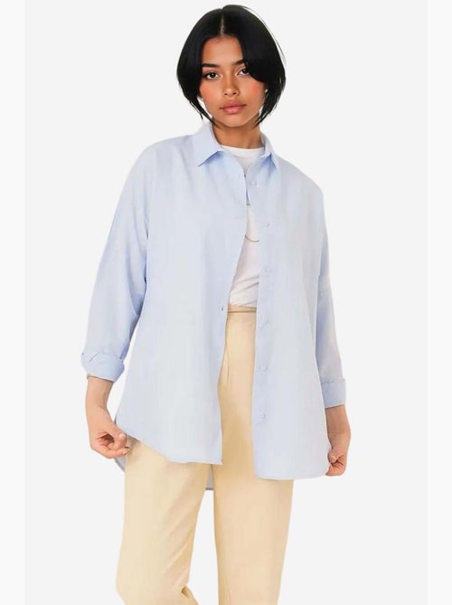 Camisa de popelina relaxed fit com fecho de botões bdart - Kiabi Camisa de popelina relaxed fit com fecho de botões bdart - Kiabi