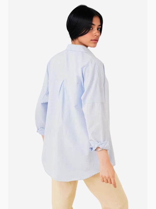 Camisa de popelina relaxed fit com fecho de botões bdart - Kiabi Camisa de popelina relaxed fit com fecho de botões bdart - Kiabi
