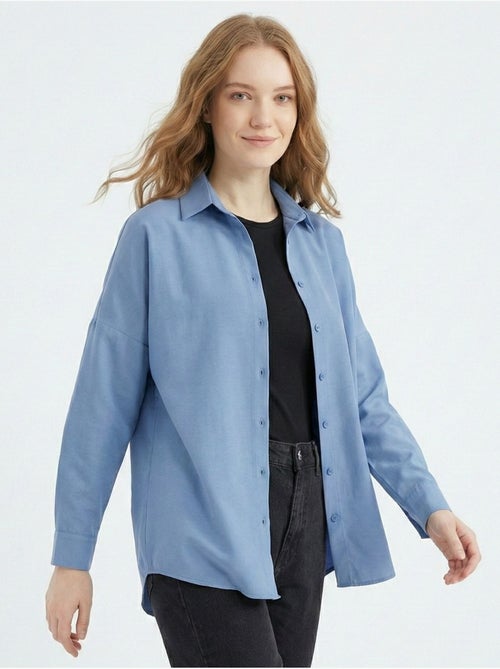 Camisa de popelina relaxed fit com fecho de botões bdart - Kiabi Camisa de popelina relaxed fit com fecho de botões bdart - Kiabi