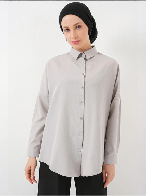 Camisa de popelina relaxed fit com fecho de botões bdart - Kiabi Camisa de popelina relaxed fit com fecho de botões bdart - Kiabi